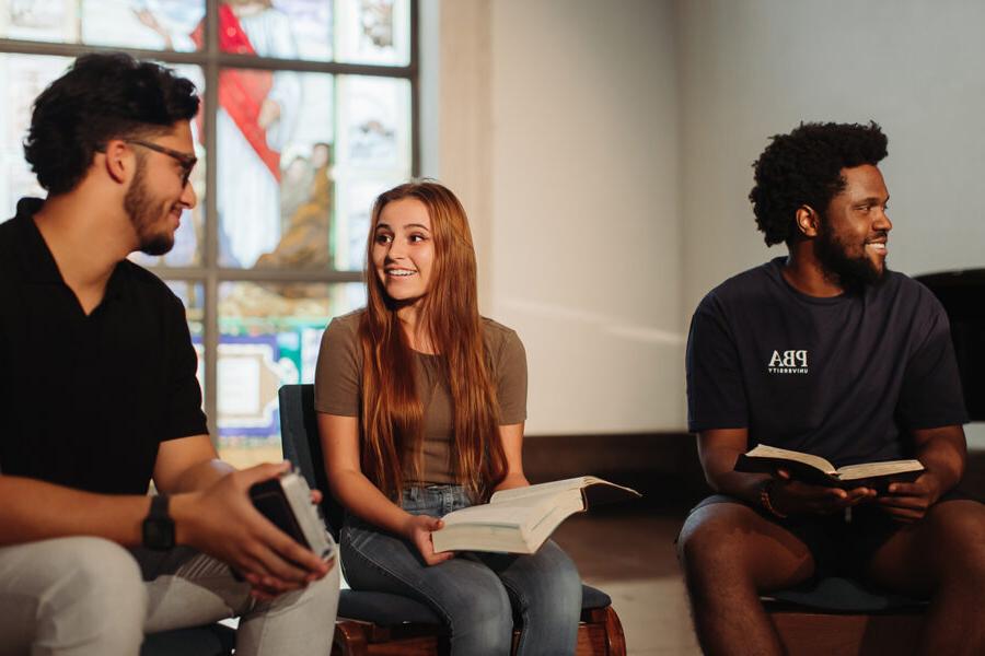 students in the concentration in preaching and teaching read from the bible together